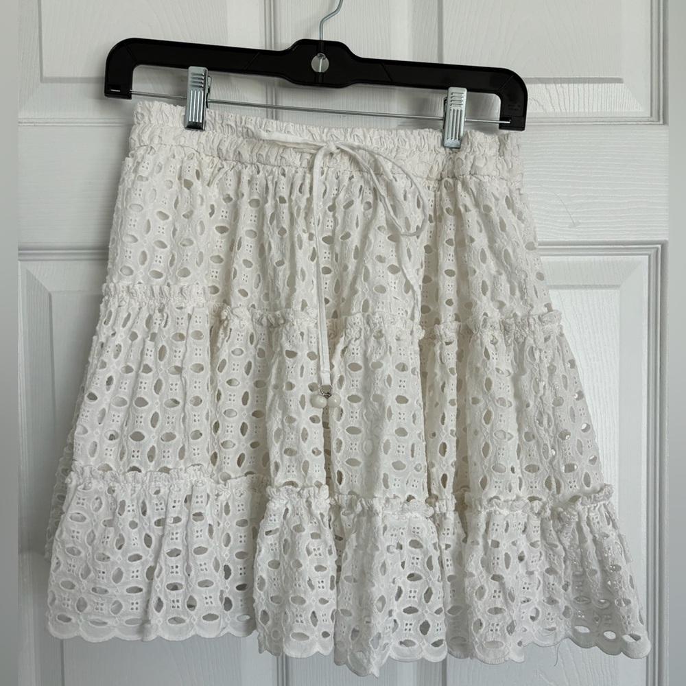 Zara size XS White eyelet Ruffle Mini Skirt White With Waist Tie.